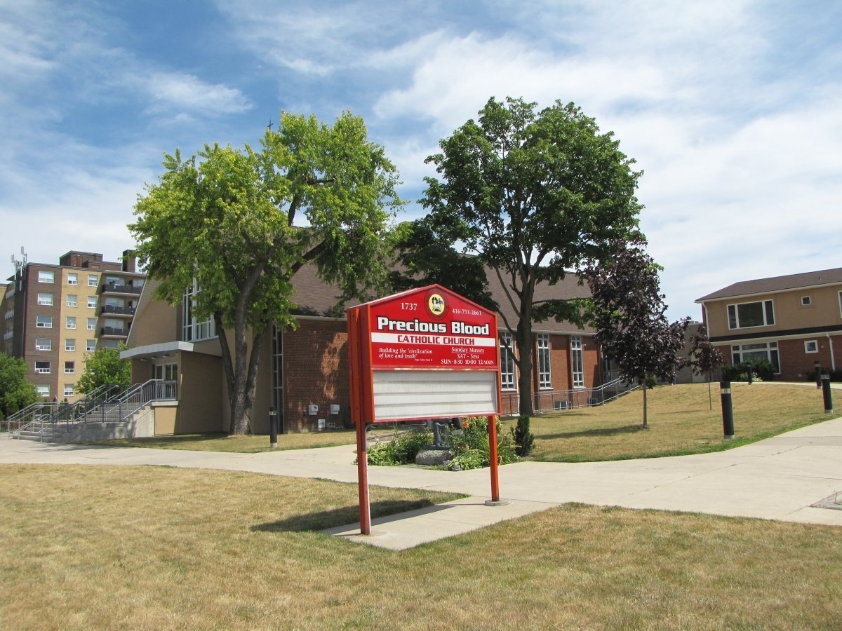 Front of Parish with Sign